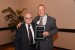 Dr. Nagib Callaos, General Chair, giving Dr. Russel Jay Hendel a plaque "In Appreciation for Delivering a Great Keynote Address at a Plenary Session."